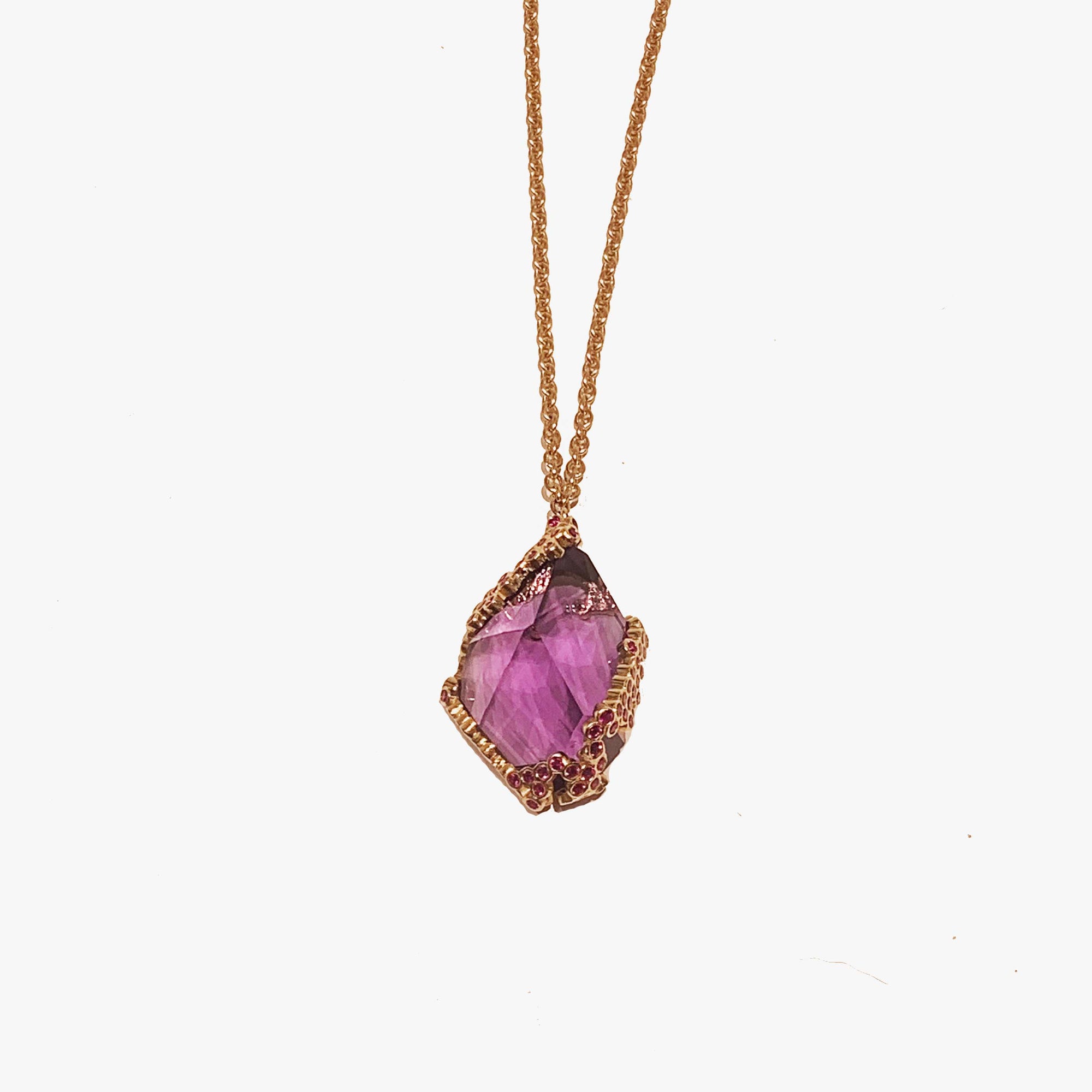 Freeform amethyst pendant necklace with pink sapphire accents