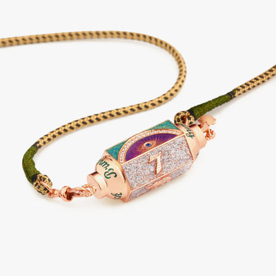 18k rose gold lucky locket with diamonds, sapphire and enamel on a black and gold Rathi cord
